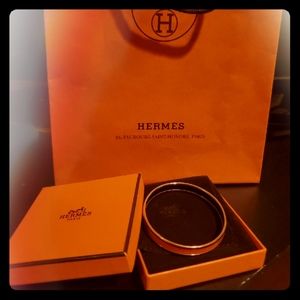 Hermes bracelet in orange. Hermès Caleche Enamel B